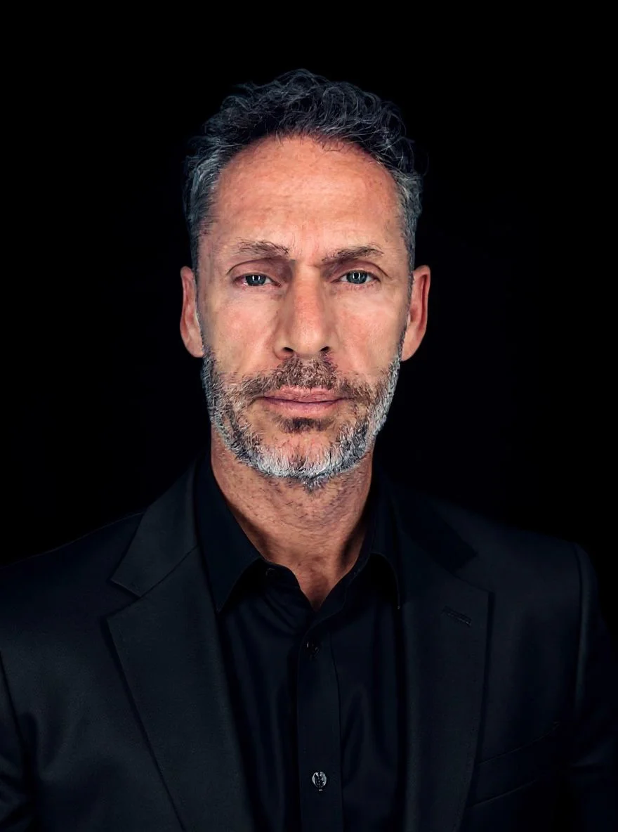 Michael Chase headshot, black background