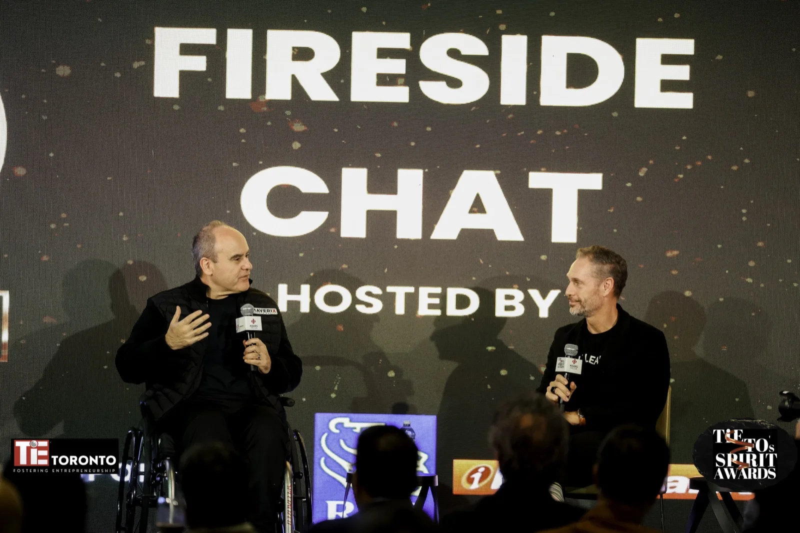 Michael Chase hosting the fireside with John Ruffolo at the TiE Toronto Spirit Awards, 2024